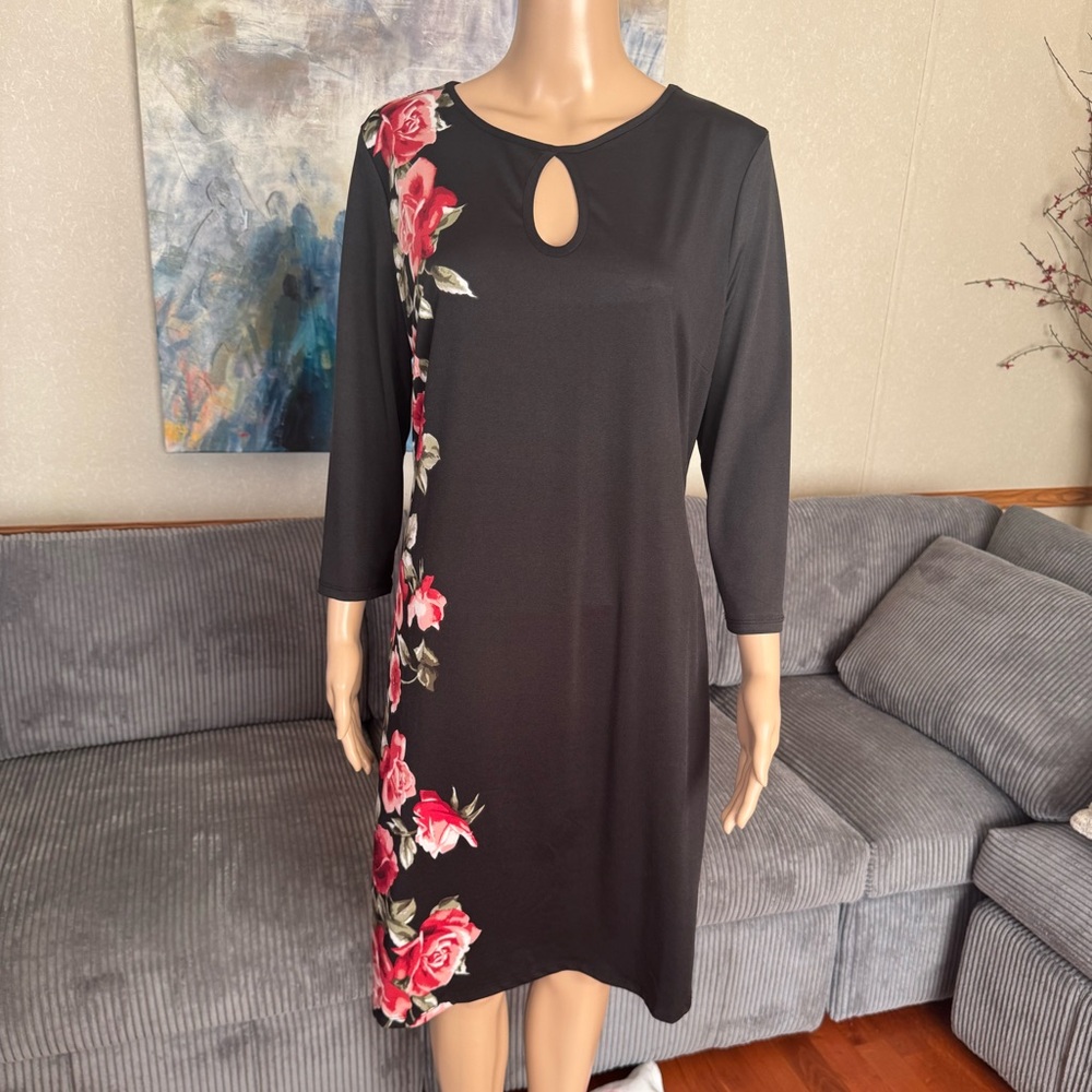 Elegant Black Asymmetrical Dress with Floral Accents